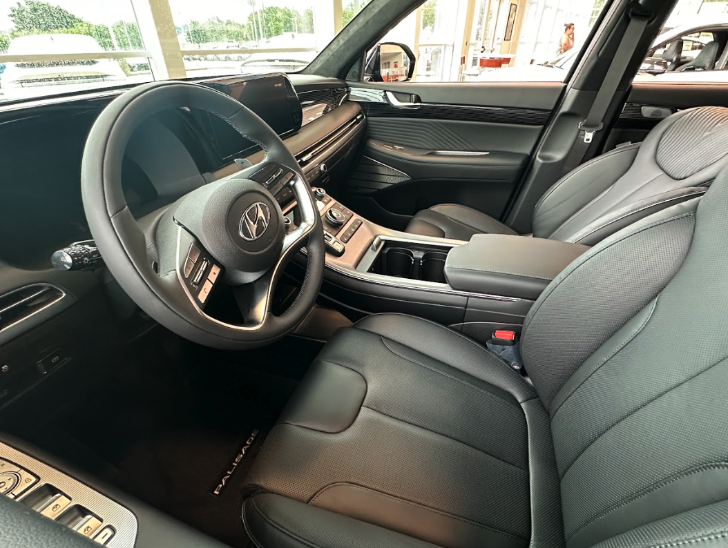 Modern Hyundai vehicle interior featuring advanced technology and push-button start